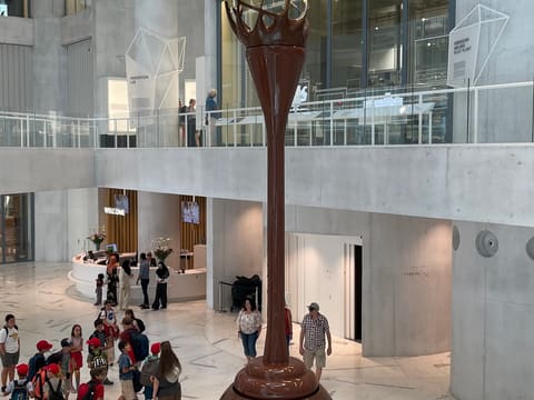 The tall chocolate fountain in the atrium of the Lindt Home of Chocolate in Kilchberg