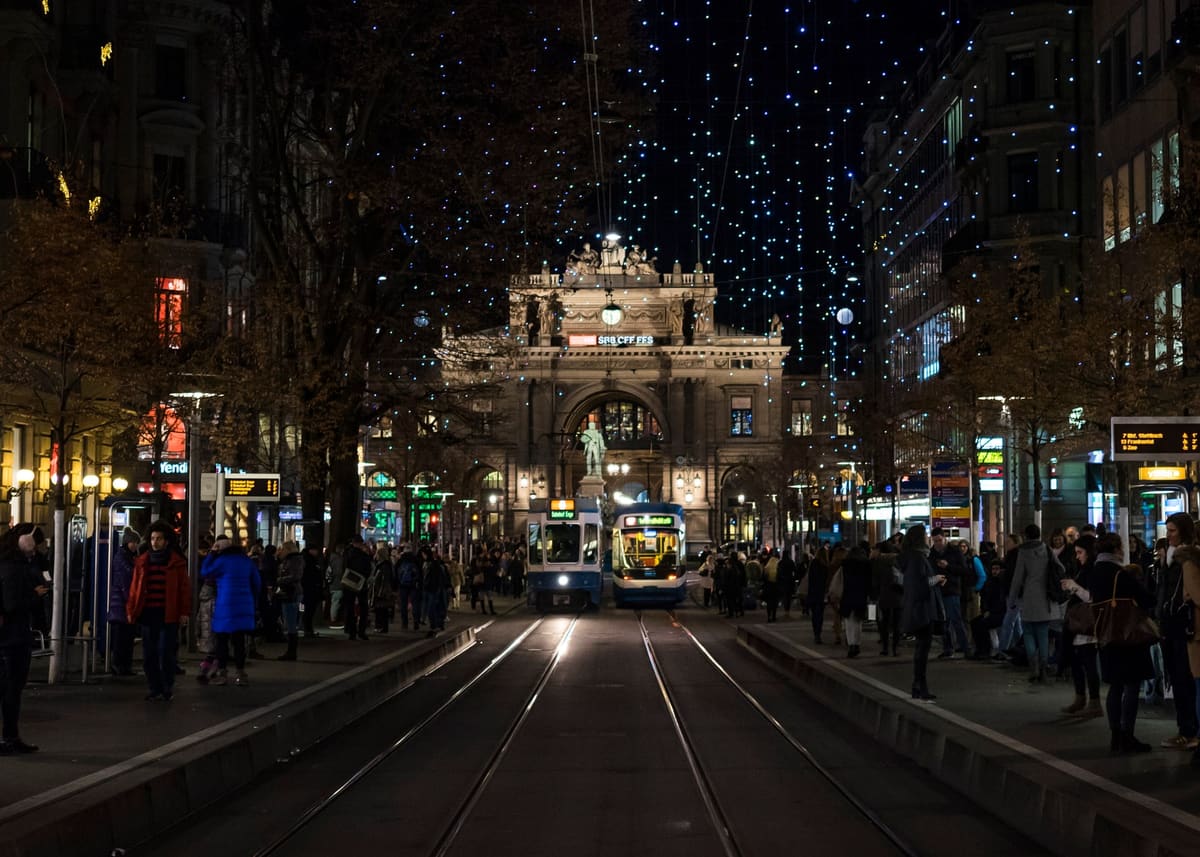 Bahnhofstrasse in Zurich at night under the Lucy Christmas lights, looking towards the main station